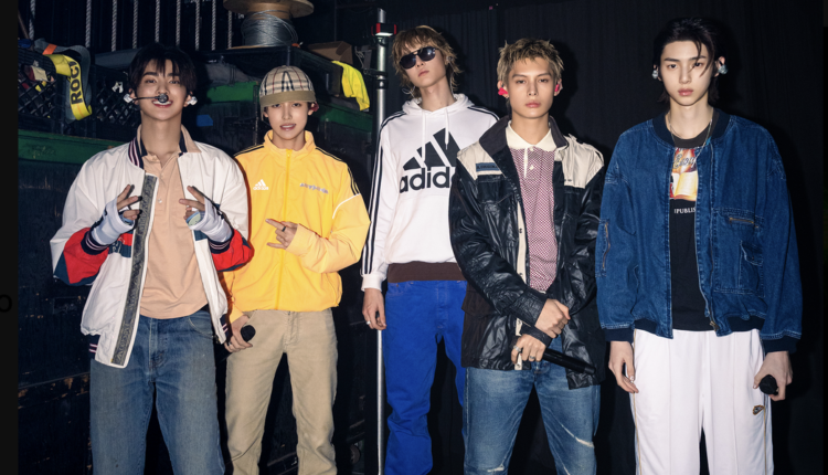 Members of the kpop group, CORTIS, standing tall, looking at the camera.